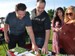 Following the groundbreaking for the new Coryell Field at Evangel University, brothers Dan and David Coryell check out the new AstroTurf 3D3 that will cover the football/soccer field by the end of this summer.